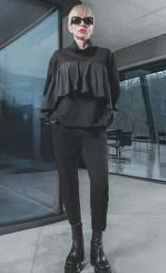 Front full body view of a model wearing the xenia drem shirt.