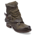 Load image into Gallery viewer, Outer front side view of the emerson boot in jungle (olive). This boot has a lace up front with a leather overlay that&#39;s secured with a buckle.

