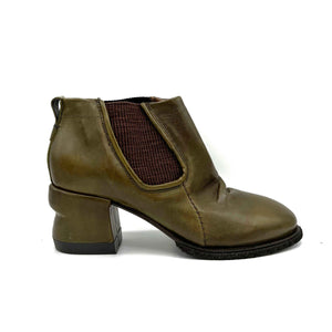 Outer side view of the A.S.98 Lavern Chelsea Boot in jungle. This boot is olive green with brown elastic gores on the side, a layered instep, and a grooved chunky heel.