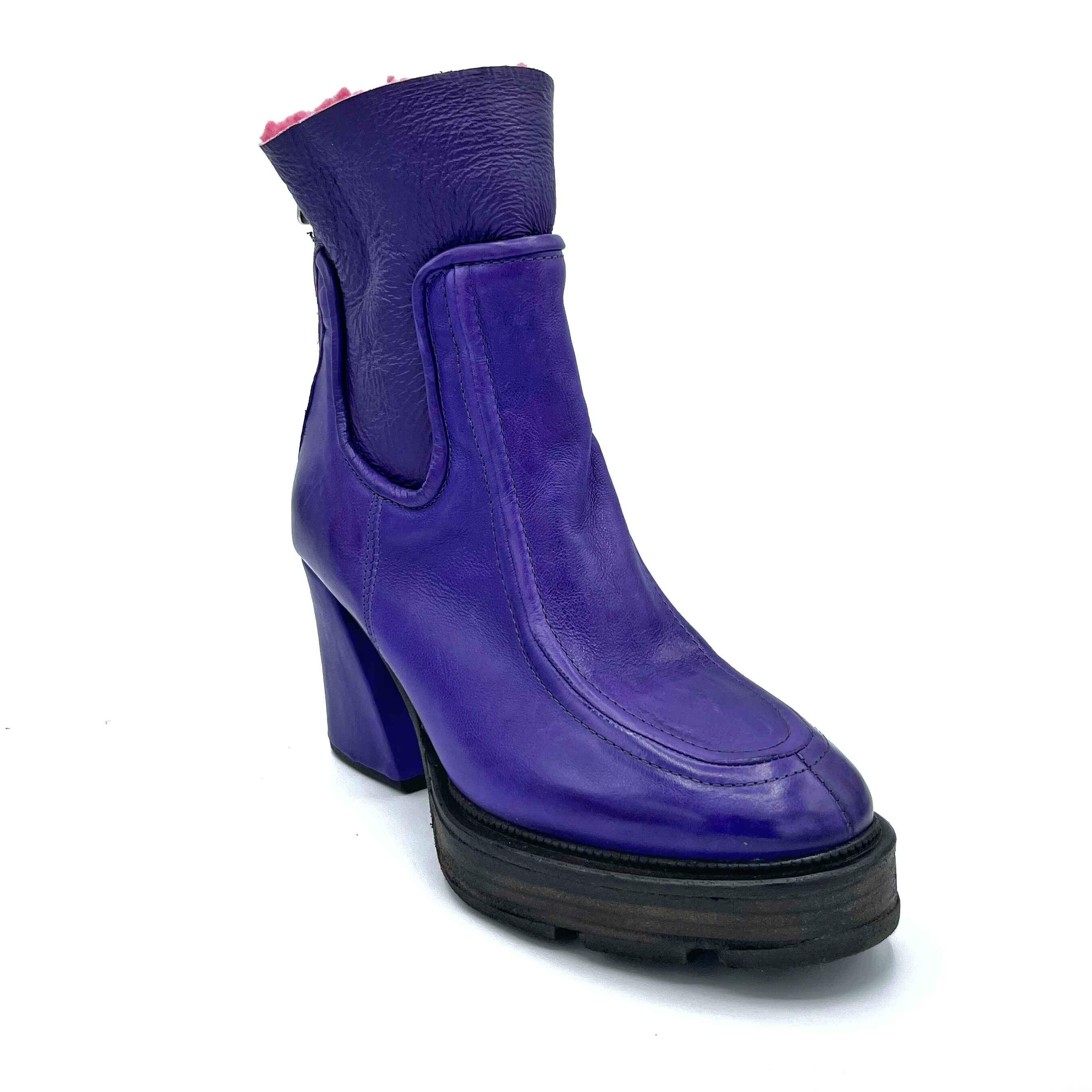 outer front side view of the A.S.98 Linkin Fur Boot in toxic. This boot is purple on the outside with pink sherpa lining. The boot has a high heel and almond toe.