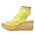 Load image into Gallery viewer, Inner side view of the AS98 naylor wedge sandal in the color zen/yellow. this sandal has a wood-like wedge and leather covering the foot and ankle. The sandal has an open toe and heel.
