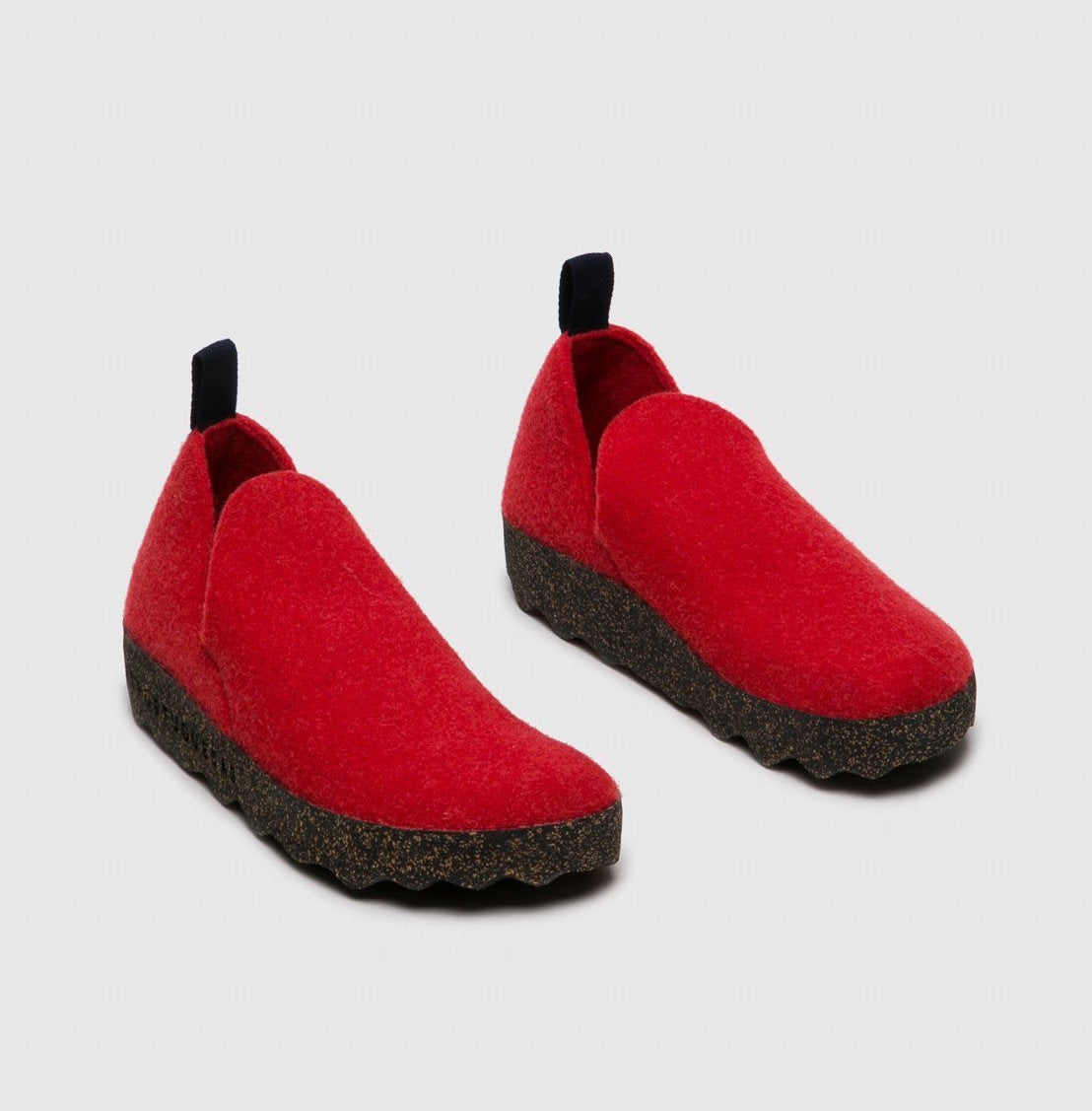 outer front side view of the asportuguesas city ankle boot in the color red. This boot has a wool/felt looking upper with side slits and a cork looking sole.