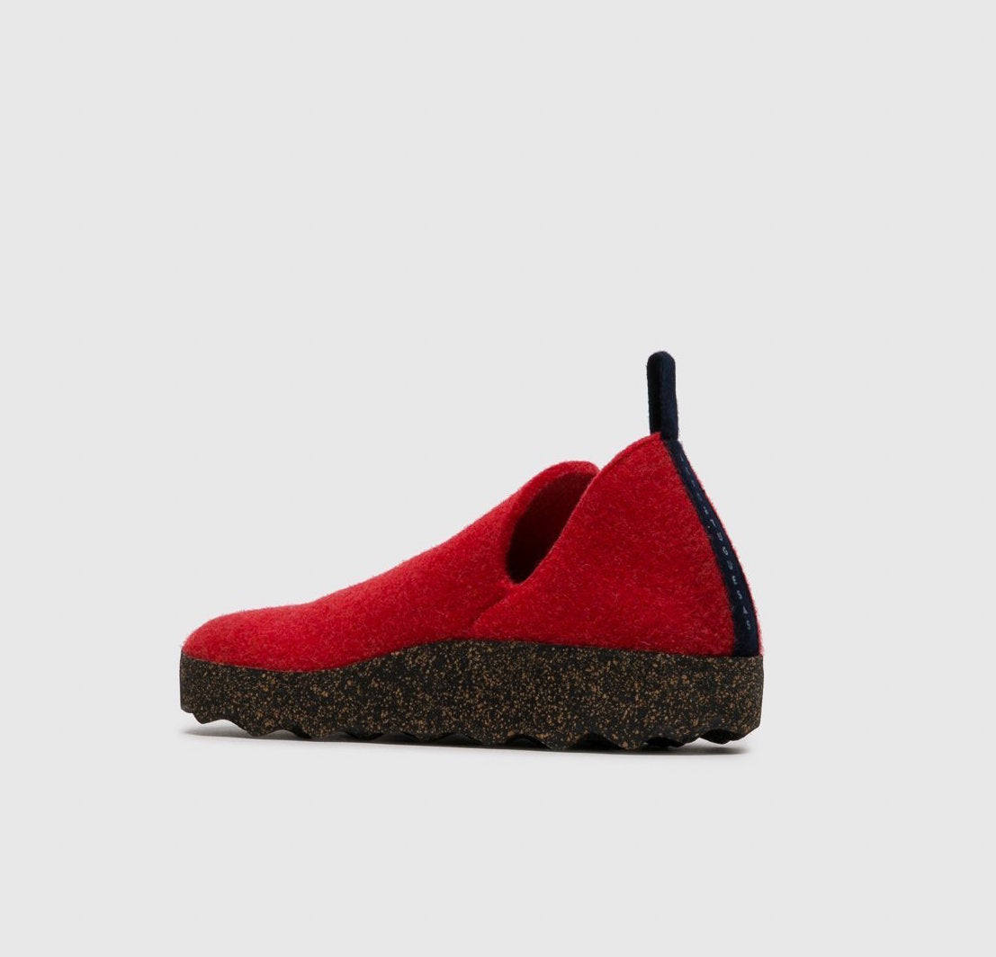 Inner side view of the asportuguesas city ankle boot in the color red. This boot has a wool/felt looking upper with side slits and a cork looking sole.