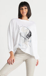 Load image into Gallery viewer, Front top half view of a model wearing the planet abstract luxury boxy tee.
