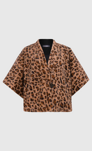Front view of the Alembika kenya kimono in a brown cheetah print. This kimono has a single front button, short sleeves, and a fuzzy appearance.