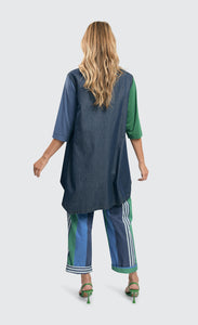 Back full body view of a woman wearing the alembika denim top.