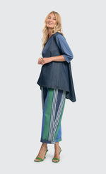 Load image into Gallery viewer, Front full body view of a woman wearing the alembika denim top.
