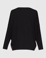 Load image into Gallery viewer, Back view of the alembika leopard panel top. This top has solid black drop shoulder dolman sleeves and a solid black back.
