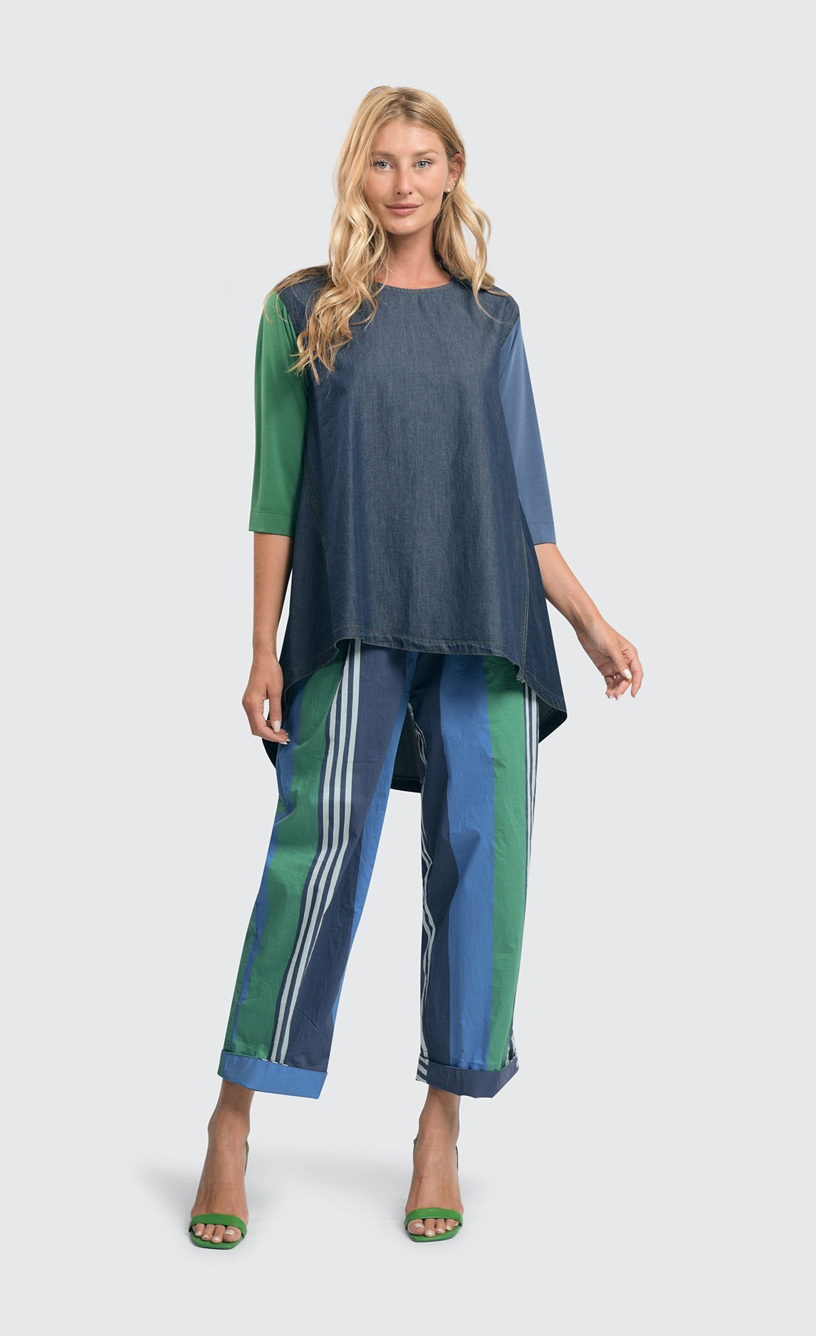 front full body view of a woman wearing the alembika ocean stripes 4-pocket trousers.