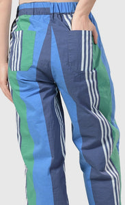 back bottom half view of a woman wearing the alembika ocean stripes 4-pocket trousers.