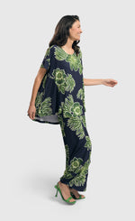 Load image into Gallery viewer, Front full body view of a woman wearing the alembika royal/green hula hi-lo swing top
