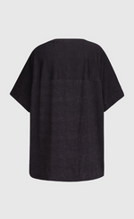 Load image into Gallery viewer, Back view of the alembika circles top. This top is a washed black with solid black back and solid black raglan sleeves.
