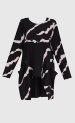 Load image into Gallery viewer, Front view of the alembika urban marble pocket top. This top is black with a white marbling print. The top has long sleeves, a round neck, and two front draped pockets.

