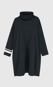 Front view of the alembika urban ribbon cowl neck tunic top in black. This tunic has deep side slits, a cowl neck, and long sleeves with two white stripes on the right arm.
