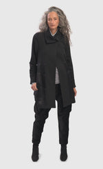 Load image into Gallery viewer, Front full body view of a woman wearing the alembika urban sleek satin trim jacket in black. This jacket has a single button closure and satin panels on the side.
