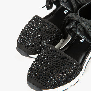 close up view of the All Black amazing gems sneaker sandal pair. This sneaker sandal has a lace up front separated from the toe upper. The upper on the toe is decorated with black rhinestones