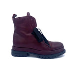 Load image into Gallery viewer, Outer view of the all black ankle tie camper boot. This boot has a lug/combat boot look with wide black laces and an ankle length shaft. These boots are wine colored.
