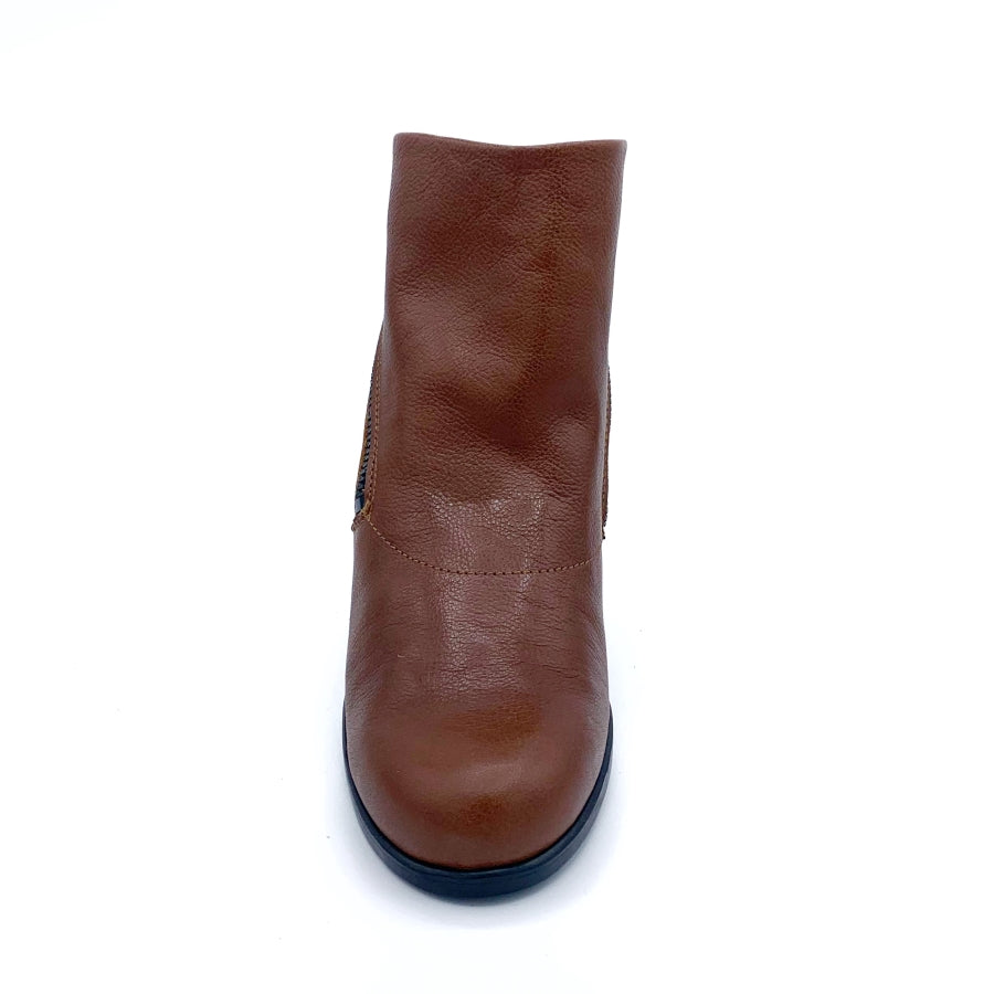 Front view of the all black double zip hi bootie. This bootie is brown/orange colored. It has a zipper on each side and a round toe.