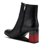 Load image into Gallery viewer, Inner side view of the azura fabulosa boots. These boots are black with a black to red faded heel. The Boot has an inner zipper.
