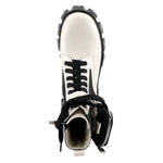 Load image into Gallery viewer, Birdseye view of a azura stoked boot. This boot is beige and black with a black lace up front and a black lug sole. The boot has a decorative strap around the ankle with a mini zip pouch attached. 
