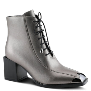 Outer front side view of the azura that girl bootie from spring footwear. This bootie is pewter colored with a black lace up front, a black block heel, and decorative black shiny square toe guard.