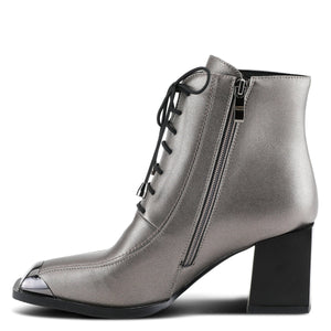 Inner side view of the azura that girl bootie from spring footwear. This bootie is pewter colored with a black lace up front, a black block heel, and decorative black shiny square toe guard.