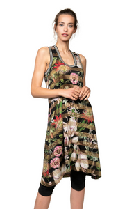 Front top half view of a woman wearing the Beate Heymann Floral Striped Dress. This dress is sleeveless with black and white striping around the scoop neck and arm holes. It also has a black and gold stripped pattern with a botanic/floral print on op of it.