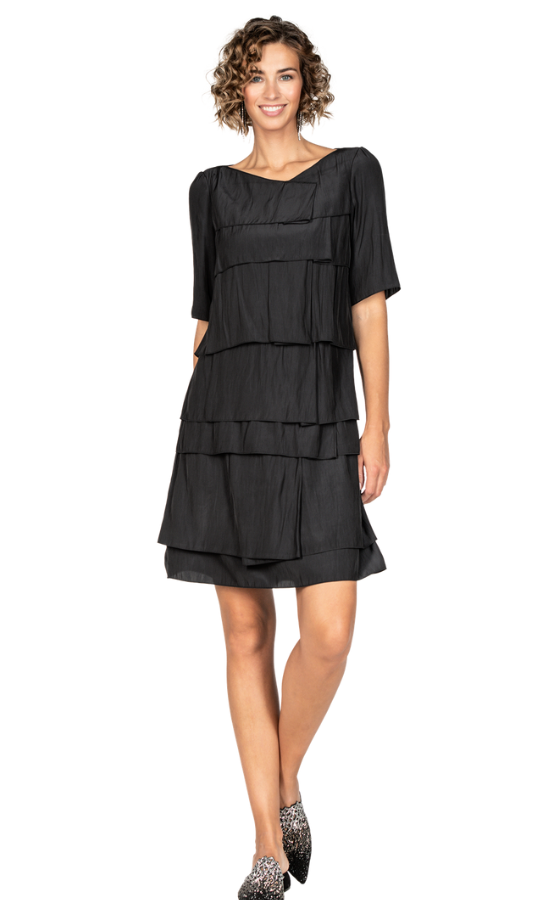 Front full body view of a woman wearing the beate heymann waves dress in black.