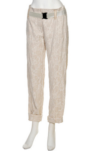 Front view of the beate heymann roll up jacquard trouser. This pant is beige with a floral print. It has a roll up hem, and a beige elastic belt.