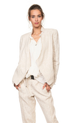 Load image into Gallery viewer, Front top half view of a woman wearing beige pants and the beate heymann jacquard wrap jacket. This jacket is beige too and being worn open over a white blouse. The jacket has a short stand collar and long sleeves
