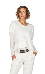 front top half view of a woman wearing the beate heymann off-white rhombe top