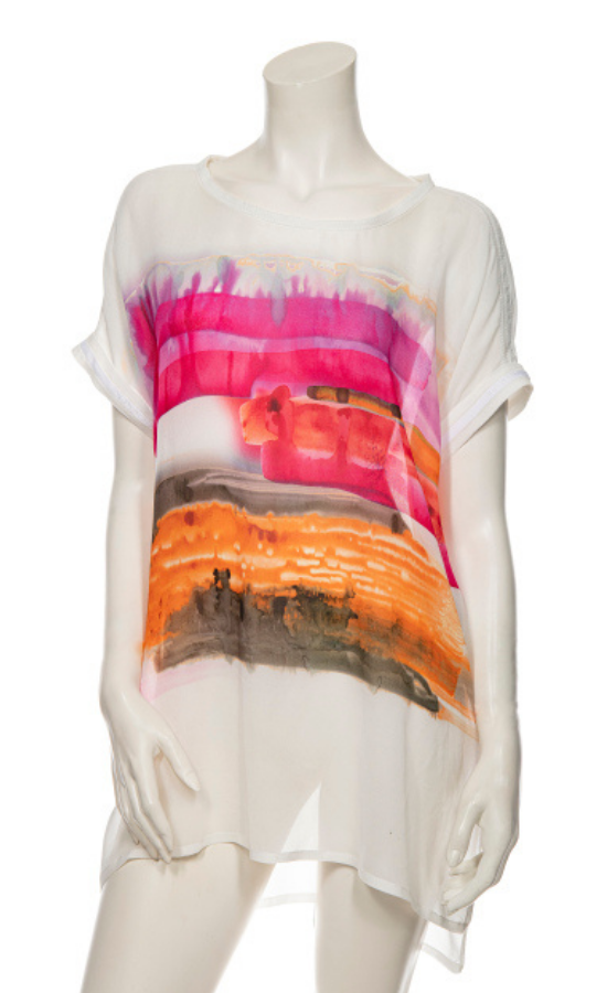 front view of a mannequin wearing the beate heymann sunset painting top. This top is white with a painted abstract sunset print on the front. It has short sleeves, a high-low hem, and side slits.