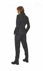 Load image into Gallery viewer, Back full body view of a woman wearing the bitte kai rand night cloud blazer jacket. This jacket has a mixed print of black and navy and long sleeves.
