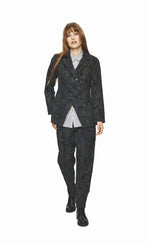 Load image into Gallery viewer, Front full body view of a woman wearing the bitte kai rand night cloud blazer jacket. This jacket has a mixed print of black and navy, long sleeves, and a button up front.
