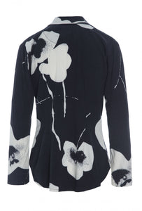 Back view of the bitte kai rand oki flower shirt. This shirt is black with large white flowers. It has long sleeves and a form-fitting silhouette.