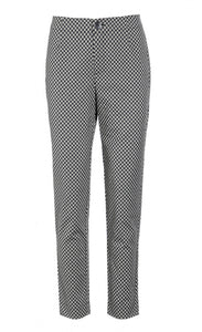 Front full body view of the bitte kai rand tiny check narrow pant. This pant is black and white checkered with a button and zip fly.
