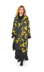 Load image into Gallery viewer, Front full body view of a woman wearing the bitte kai rand winter leaves kimono jacket. This long black jacket has yellow flowers/leaves and an off-center single front button.
