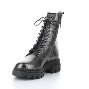 Front inner side view of the bos & co felete grey round toe boots. These boots have a lace up front, metallic shine, and inner zipper, and lug sole.