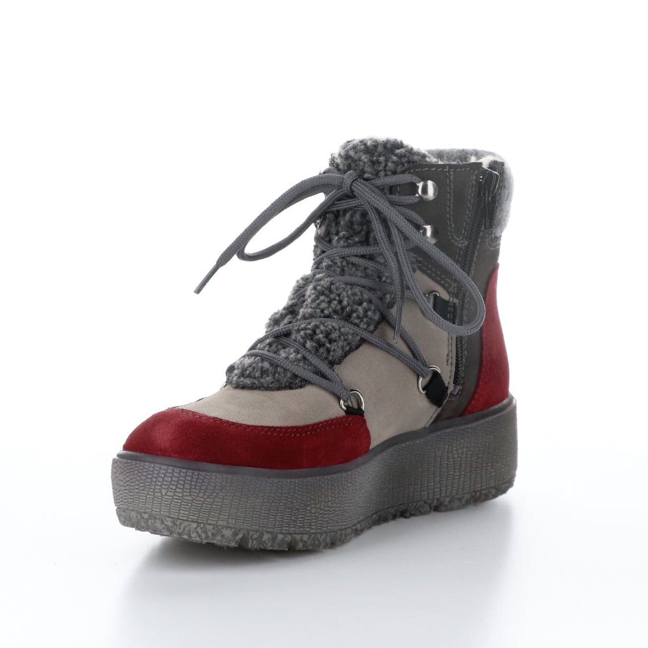 inner front side view of the bos & co ideal zip up bootie. This boot has grey, anthracite, and sangria colored suede panels and sherling upper. The boot also has a platform sole, a lace up front, and an inner side zipper..