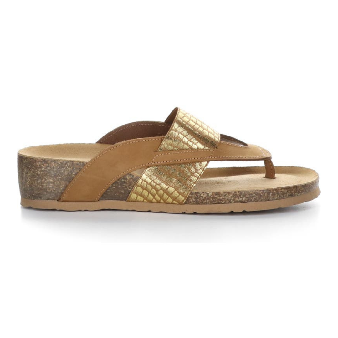 Outer view of the bos & co labelle sandal in brandy. This shoe has both a band that goes over the instep in gold and a brown thong band. The sandal also has a slight wedge and a cork sole.