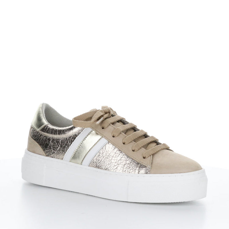 Front out side of the bos & co monic sneaker. This sneaker is beige with crinkled metallic sides, white and silver side stripes, a lace up front, and a platform sole.