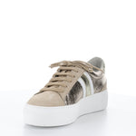 Load image into Gallery viewer, Front inner side of the bos &amp; co monic sneaker. This sneaker is beige with crinkled metallic sides, white and silver side stripes, a lace up front, and a platform sole.
