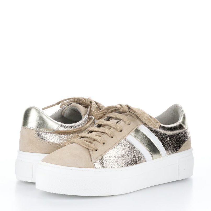 Pair of the bos & co monic sneaker. This sneaker is beige with crinkled metallic sides, white and silver side stripes, a lace up front, and a platform sole.