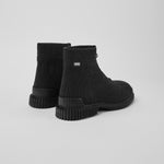 Load image into Gallery viewer, Back side view of a pair of the camper pix tencel boots. These boots are black with a textile fabric upper that have a curved pattern. The boots have a rubber sole and a zipper in the front.
