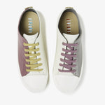 Load image into Gallery viewer, Birdseye view of a pair of the camper twins sneaker. The left sneaker is white on one side and grey on the other with purple laces. The right foot is white on one side and purple on the other side with mustard laces.
