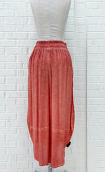 Load image into Gallery viewer, Back view of the crea concept coral pant. This pant has a wide leg with a tapered bottom and an elastic, scrunched waistband.
