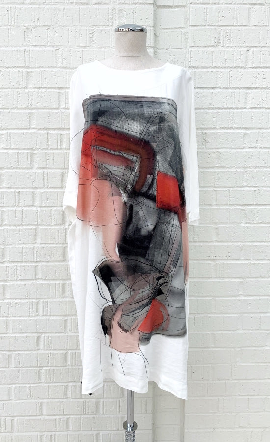 Front view of the Crea Concept Abstract T-Shirt Dress. This dress is white with 3/4 length sleeves, a round neck, and an abstract grey/orange print in the front.