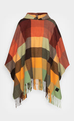 Load image into Gallery viewer, Front view of the desigual plaid poncho. This poncho is brown, red, orange, and green plaid. It has a hood and a fringed hem.
