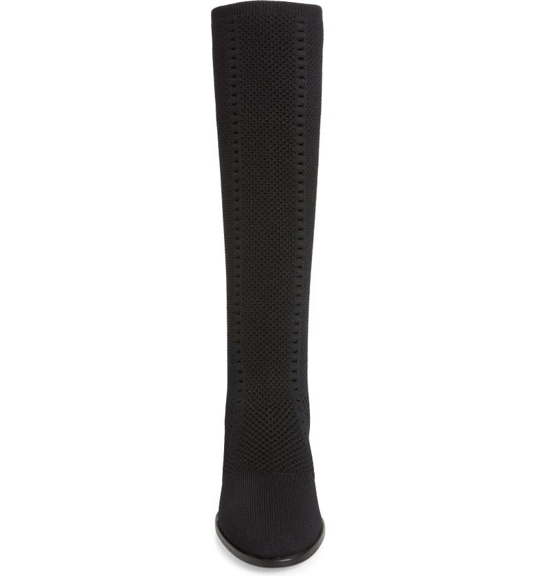 Front view of the eileen fisher alas knit boot. This black boot comes up below the knee. It has a knitted fabric upper and an almond toe