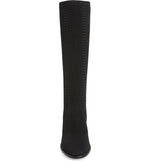 Load image into Gallery viewer, Front view of the eileen fisher alas knit boot. This black boot comes up below the knee. It has a knitted fabric upper and an almond toe
